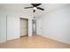 Bright bedroom features a spacious closet and neutral walls creating a serene atmosphere at 562 W Keats Ave, Mesa, AZ 85210