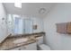 Well-lit bathroom featuring granite countertops, modern fixtures, and a glass-enclosed shower at 6223 N 12Th St # 8, Phoenix, AZ 85014