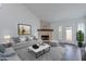 Cozy living room featuring a stone fireplace and comfortable seating at 6223 N 12Th St # 8, Phoenix, AZ 85014