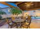 Cozy outdoor seating area with a pool view, ideal for relaxing and entertaining guests at 6223 N 12Th St # 8, Phoenix, AZ 85014