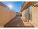 Private outdoor patio with brick flooring, offering a perfect space for relaxation and entertaining at 6223 N 12Th St # 8, Phoenix, AZ 85014