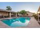 Community pool area complete with sun loungers and shade for a relaxed environment at 6223 N 12Th St # 8, Phoenix, AZ 85014