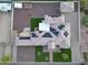 Stunning aerial view of the property showcasing the lush landscaping, sparkling pool, and expansive grounds at 6615 E Shea Blvd, Scottsdale, AZ 85254