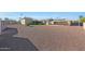 Exterior view featuring a large backyard and outdoor kitchen at 6615 E Shea Blvd, Scottsdale, AZ 85254