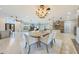 Open floorplan with dining area and a beautiful view of the fireplace at 6615 E Shea Blvd, Scottsdale, AZ 85254