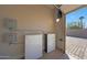 Tesla power walls in the garage, ensuring home energy backup and promoting sustainable living at 6615 E Shea Blvd, Scottsdale, AZ 85254