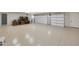 Spacious garage with epoxy flooring and ample storage space, providing secure parking and room for hobbies at 6615 E Shea Blvd, Scottsdale, AZ 85254