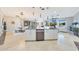 Open concept kitchen offering a spacious layout with an island and stainless steel dishwasher at 6615 E Shea Blvd, Scottsdale, AZ 85254