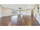 Spacious living room featuring tile floors and a ceiling fan at 6615 E Shea Blvd, Scottsdale, AZ 85254