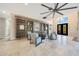 Bright living room featuring custom built-in bookshelves, and elegant furniture at 6615 E Shea Blvd, Scottsdale, AZ 85254