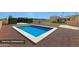 A luxurious swimming pool with a manicured pergola promises relaxation and upscale desert living at 6615 E Shea Blvd, Scottsdale, AZ 85254