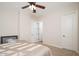 Bright bedroom featuring an ensuite bathroom at 7157 E Ivyglen Cir, Mesa, AZ 85207