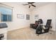 Dedicated exercise room featuring fitness equipment and natural light at 7157 E Ivyglen Cir, Mesa, AZ 85207