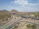 Aerial shot capturing highway with several lanes and desert mountains in the background at 750 E Northern Ave # 1079, Phoenix, AZ 85020