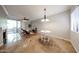 Open-concept living area with tile floors, fireplace, and sliding doors to the outdoor space at 750 E Northern Ave # 1079, Phoenix, AZ 85020