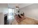 Bright living area with fireplace and access to the outdoor patio via sliding glass doors at 750 E Northern Ave # 1079, Phoenix, AZ 85020