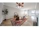 Open living area with stylish furnishings, a fireplace, and access to other parts of the home at 750 E Northern Ave # 1079, Phoenix, AZ 85020
