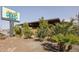 Exterior view of a restaurant with lush landscaping and modern design elements at 750 E Northern Ave # 1079, Phoenix, AZ 85020