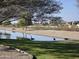 Picturesque pond reflecting the natural beauty of the surrounding community at 7576 W Quail Ave, Glendale, AZ 85308