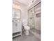 Stylish bathroom featuring a glass-enclosed shower, modern vanity, and gray hexagon tile flooring at 836 W Watson Dr, Tempe, AZ 85283