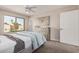 Bedroom featuring a neutral color palette, ample natural light, and plush carpeting at 836 W Watson Dr, Tempe, AZ 85283