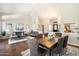 Spacious living and dining area with hardwood floors, high ceilings and natural light at 9098 N 117Th Way, Scottsdale, AZ 85259