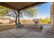 Spacious backyard patio, perfect for outdoor relaxation and entertaining with desert views at 9121 W Quail W Trl, Queen Creek, AZ 85144