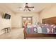 Inviting main bedroom offers great natural light and access to outdoor space at 9121 W Quail W Trl, Queen Creek, AZ 85144