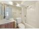 Full bathroom featuring a tub/shower combo, vanity, and ample space at 931 W Hermosa Dr, Tempe, AZ 85282