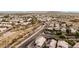 High-angle view of a suburban community featuring neatly arranged houses and desert landscaping at 1003 W Aire Libre Ave, Phoenix, AZ 85023