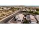 Beautiful aerial shot of a home, showcasing its desert landscaping and proximity to nearby community amenities at 1003 W Aire Libre Ave, Phoenix, AZ 85023