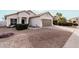 Charming single-story home featuring low-maintenance landscaping and a welcoming entrance at 1003 W Aire Libre Ave, Phoenix, AZ 85023