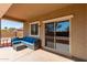 A covered patio with outdoor seating, and view of the desert sky at 101 W Seven Seas Dr, Casa Grande, AZ 85122