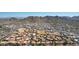 Wide aerial shot featuring a neighborhood surrounded by scenic mountains, highlighting the area's natural beauty and architecture at 10224 N 12Th Pl # 1, Phoenix, AZ 85020