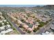 Overhead view of a community with red-tiled roofs, mature trees, and meticulously maintained landscaping, creating a serene setting at 10224 N 12Th Pl # 1, Phoenix, AZ 85020