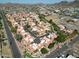 Aerial shot of a vibrant townhome community featuring neat streets and mountain views at 10224 N 12Th Pl # 1, Phoenix, AZ 85020