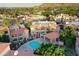 Aerial view of the community with a pool and palm trees at 10224 N 12Th Pl # 1, Phoenix, AZ 85020