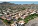 Overview of a townhome community with red tile roofs and landscaped common areas at 10224 N 12Th Pl # 1, Phoenix, AZ 85020