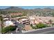 Overhead image of a community featuring red-tiled roofs, lush greenery, a water feature, and manicured lawns at 10224 N 12Th Pl # 1, Phoenix, AZ 85020