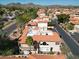 Overhead view of the townhome featuring a red tiled roof, complemented by mature landscaping and a private patio at 10224 N 12Th Pl # 1, Phoenix, AZ 85020