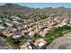 High-angle view of residential homes with desert landscaping, offering mountain views and a sense of community at 10224 N 12Th Pl # 1, Phoenix, AZ 85020