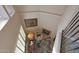 Top view of living room with cozy seating, a fireplace, and natural light at 10224 N 12Th Pl # 1, Phoenix, AZ 85020
