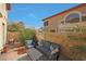Relaxing patio featuring comfortable seating, decorative pillows, and a lush plant creating an inviting outdoor space at 10224 N 12Th Pl # 1, Phoenix, AZ 85020