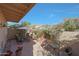 Cozy patio with outdoor seating, brick pavers, mature plants offering a serene and private retreat at 10224 N 12Th Pl # 1, Phoenix, AZ 85020