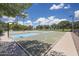 Full basketball court with professional lines and nets under a bright sky at 10353 N 115Th Ave, Youngtown, AZ 85363