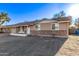 Charming single-story home with a brick accent and a well-lit facade at 12211 N 25Th Ave, Phoenix, AZ 85029