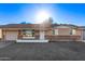 Charming single-story home with a brick accent and a well-lit facade at 12211 N 25Th Ave, Phoenix, AZ 85029