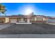 Charming single-story home with a brick accent and a well-lit facade at 12211 N 25Th Ave, Phoenix, AZ 85029
