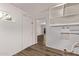 Laundry room featuring an access door to the exterior and utility hookups at 12211 N 25Th Ave, Phoenix, AZ 85029