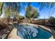 Backyard view of a fenced in pool ready for some summer fun at 12211 N 25Th Ave, Phoenix, AZ 85029